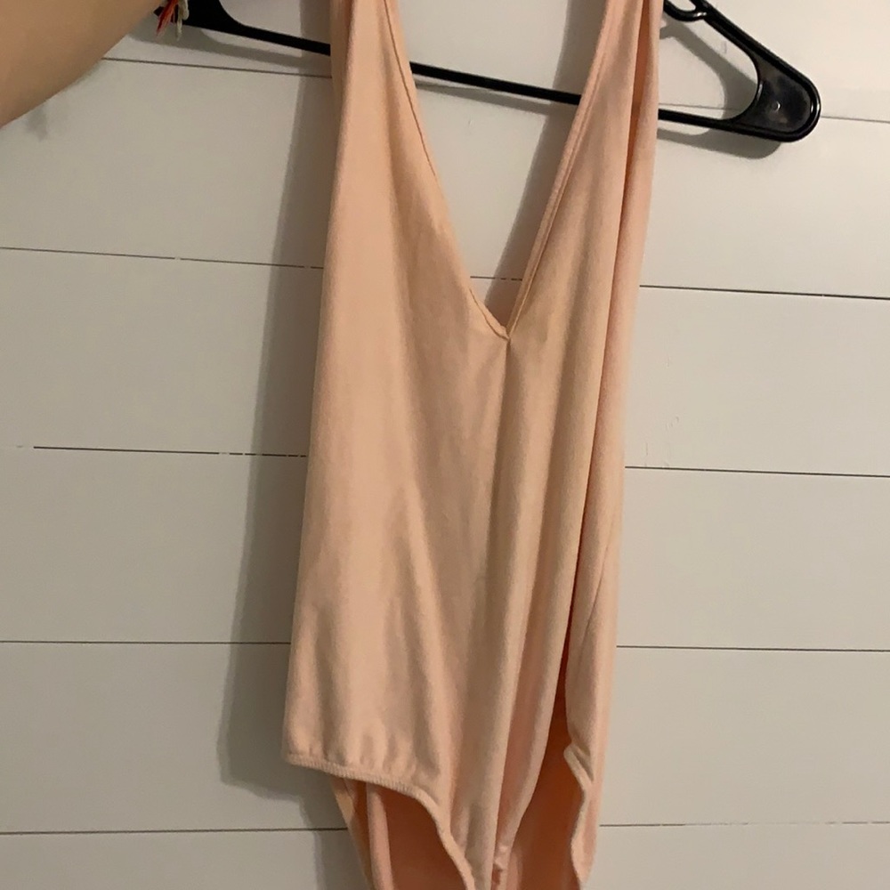 Small peach bodysuit
